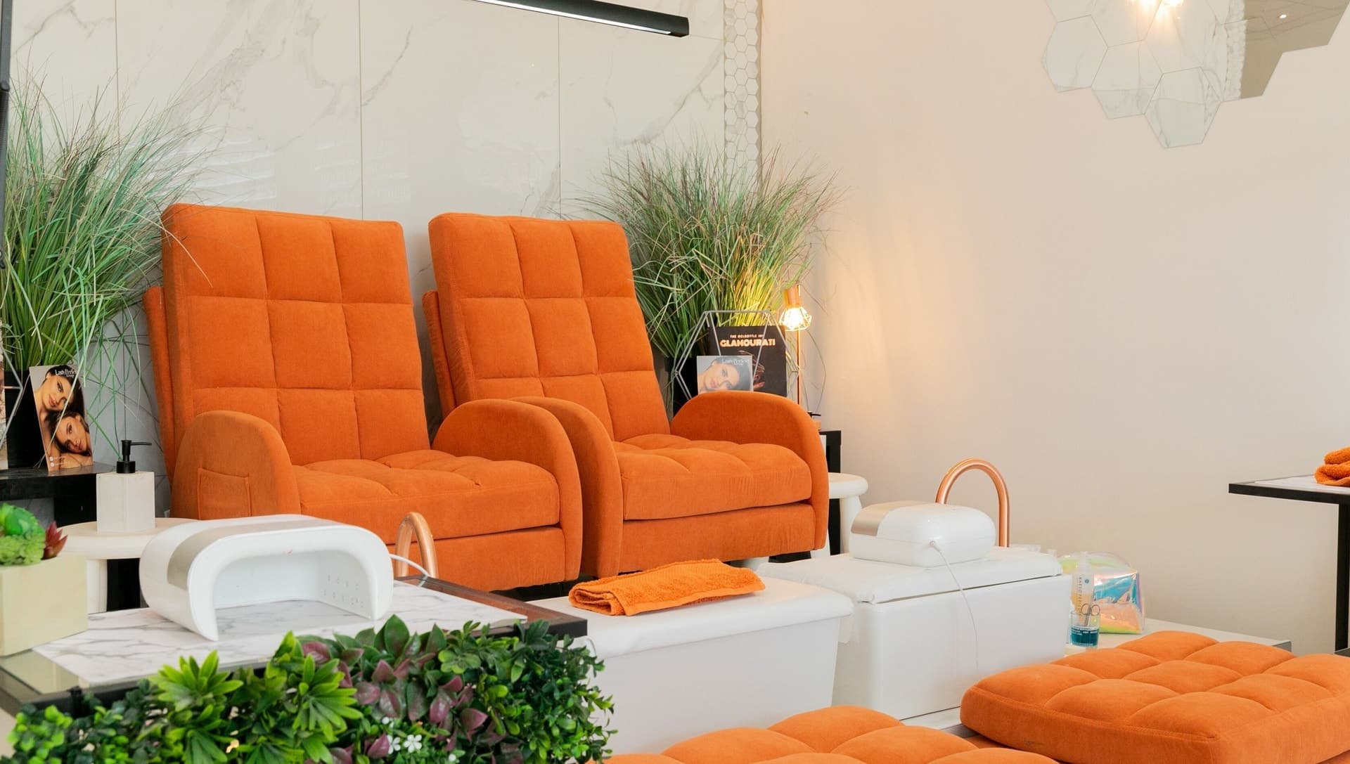 Orange chairs in the Gorgeous welcome lounge